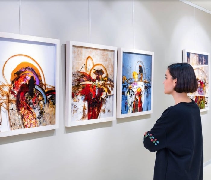 A woman looking at art at the Bergamot Station Arts Center