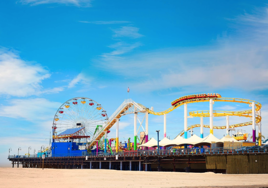 The roller coaster and ferris wheel at Santa Monica Pier