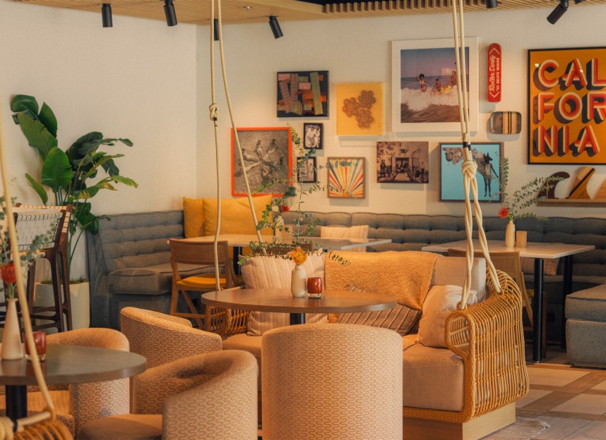 Hanging chairs, SoCal decor and ocean-inspired interior design at The Surfing Fox
