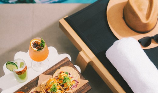 Enjoy pool bites such as tacos and cocktails provided by The Surfing Fox
