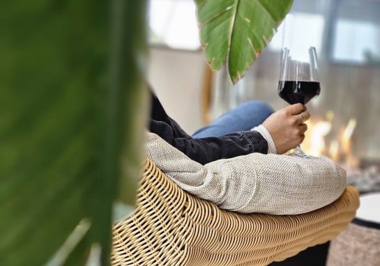 guest enjoying wine in Pierside hotel