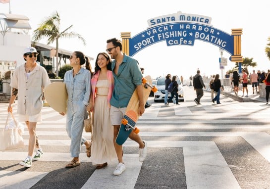 Friends walking by the Pier