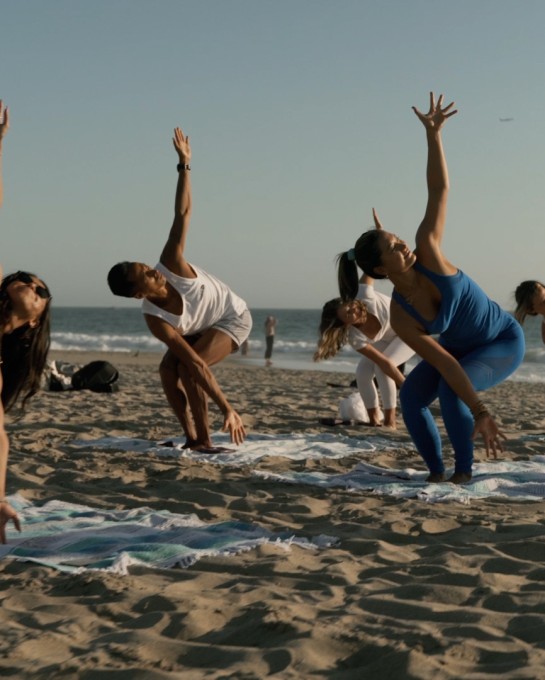 Beach Yoga hosted by The Pierside partner, Beach Yoga SoCal